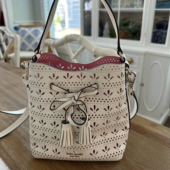 Kate Spade Cream Laser-Cut Bucket Bag with Tassel Drawstring - Picture 1 of 3